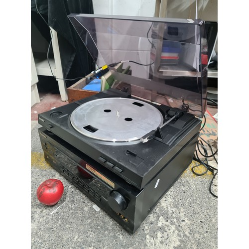 963 - Star Lot: A Sony stereo turntable system model. PS-LX300USB (missing pad), along with a Pioneer VSA-... 