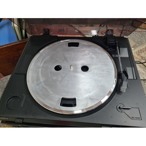 963 - Star Lot: A Sony stereo turntable system model. PS-LX300USB (missing pad), along with a Pioneer VSA-... 