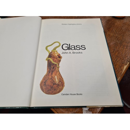 180 - Two books on glass and crystal including Swarovski's 1995 Corporate Editorial Brochure of the 100 ye... 