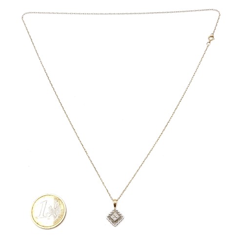 502 - A nine carat gold diamond accented pendant & chain. Length - 46 cms. Weight - 1.89 grams.