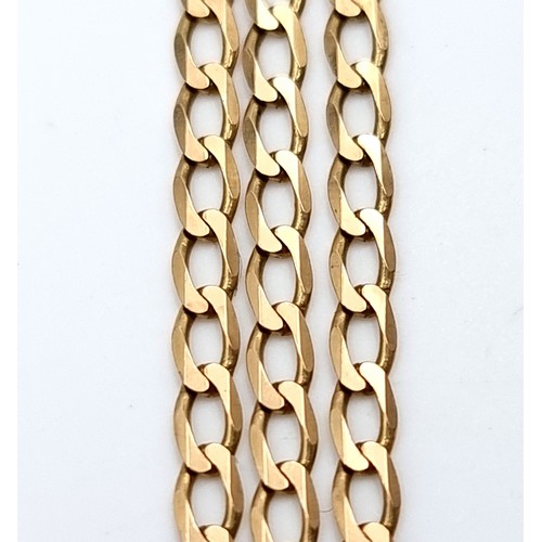 511 - Star lot : A nine carat gold flat curb necklace. Length - 50 cms, Weight - 3.57 grams.