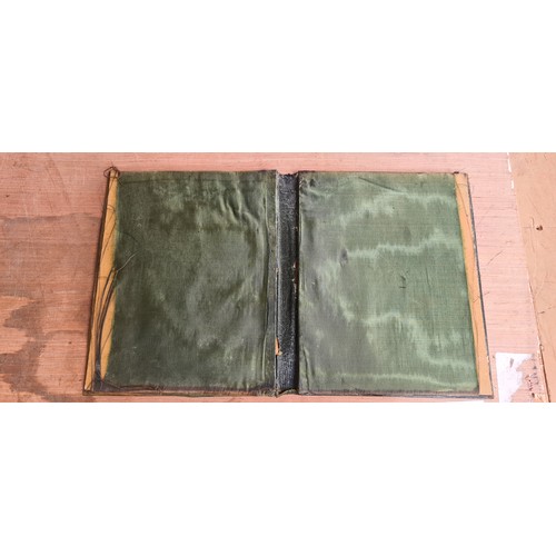 210 - A strikingly pretty antique brass embossed folio with green satin lining to interior with a beautifu... 