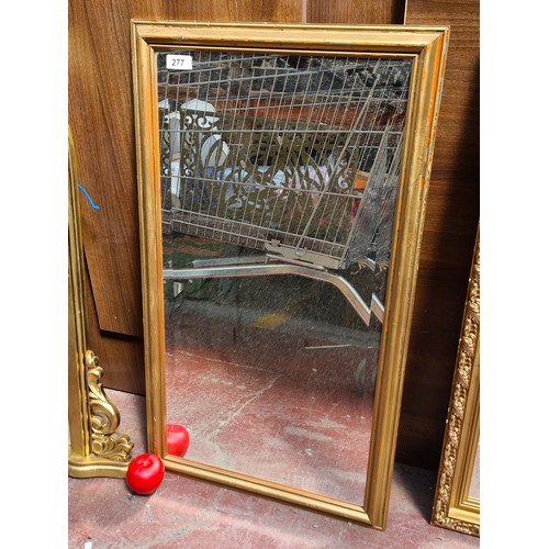 277 - A romantic gold toned framed mirror with a nice bevelled detail to glass.