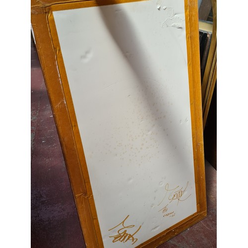 277 - A romantic gold toned framed mirror with a nice bevelled detail to glass.