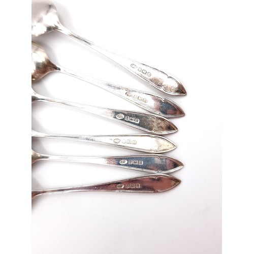 606 - A set of six sterling silver teaspoons hallmarked Birmingham - 1932. Total weight of spoons - 60.84 ... 