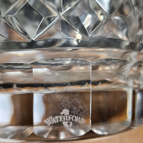 798 - Set of four Waterford crystal 12oz tumblers in the Lismore pattern with intricate cut-glass design. ... 