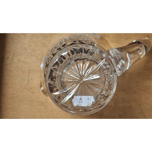 154 - A stunning large Waterford Crystal Large Whiskey water pitcher jug. In good order with acid mark to ... 