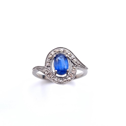 541 - Star Lot : A lovely  Kyanite blue stone ring set with diamond surround of 0.20 carats. Weight - 3 gr... 