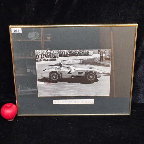 83 - A print of a photograph from the 1955 grand prix de monaco featuring the famous racing driver J M Fa... 