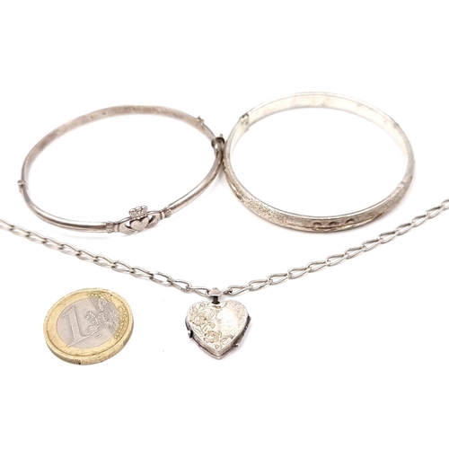 10 - A collection of items consisting of a sterling silver Claddagh bracelet together with a further silv... 