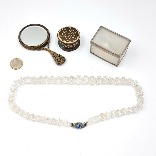 16 - A collection of four vintage items consisting of a crystal necklace with jewelled clasp. Length - 42... 