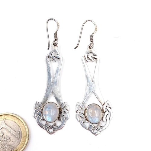 35 - A pair of sterling silver moonstone earrings with celtic design mounts - suitable for pierced ears. ... 