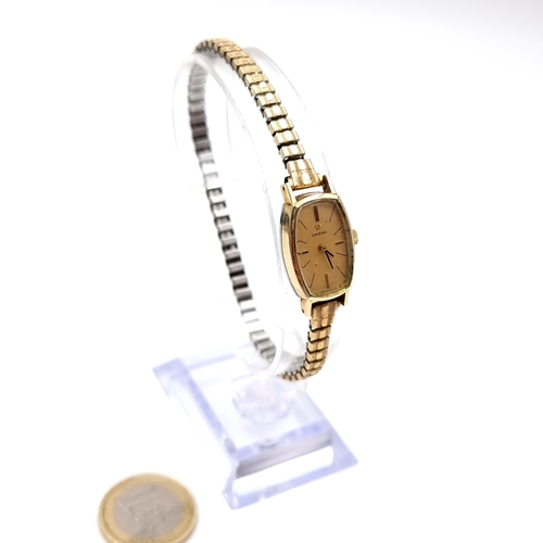 36 - Star Lot : An Omega ladies wristwatch set with pattern dial with expandable bracelet. Watch with win... 