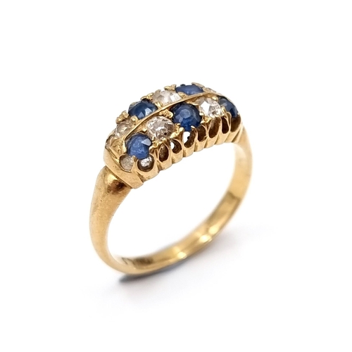 40 - Star Lot : A lovely Antique diamond and sapphire stone ring marked 18 Carat gold to band. Ring size ... 