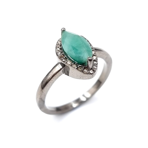 44 - Star Lot : An unusual emerald stone ring of 1.68 carats together with diamond surround of 0.25 carat... 