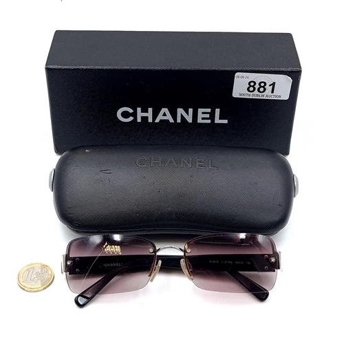 881 - A pair of outstanding Chanel sunglasses in as new condition in original tags. Together with case and... 