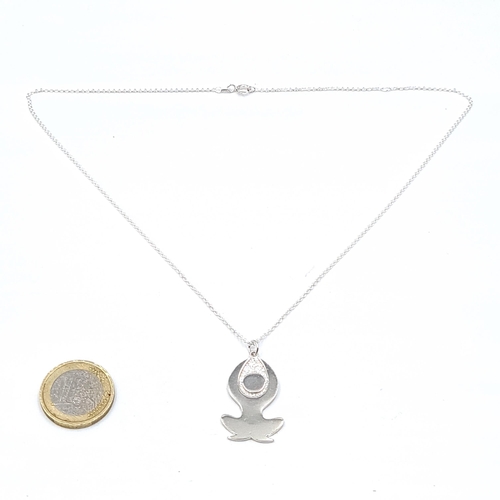 960 - A sterling silver 'Namaste' pendant & chain. Length - 44 cms. Weight - 7.09 grams. Boxed.