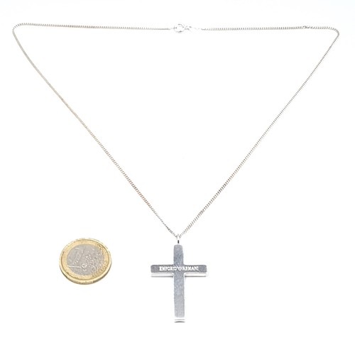A cross marked 'Emporio Armani' together with a silver chain. Length of chain - 50 cms. Total weight - 9.72 grams.