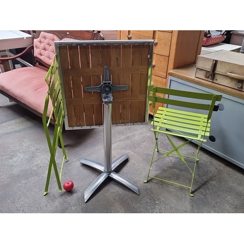 868 - Star lot : Contemporary Nisbets Bolero garden set consisting of two folding chairs in vibrant green ... 