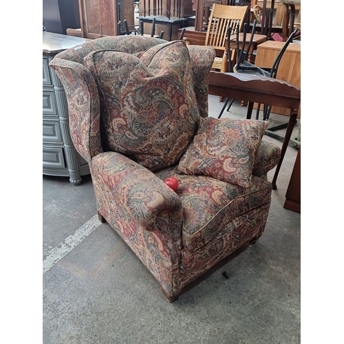 967 - A very plush vintage upholstered wingback armchair with down feather stuffed back and seat cushions ... 