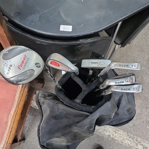 855 - Set of Hippo golf clubs with a mix of irons and a Power Oversize 1/3 wood, all housed in a multi-com... 