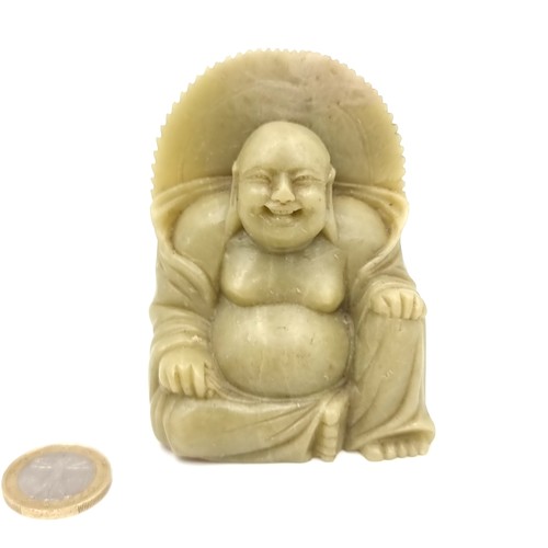 973 - A carved soap stone Happy Buddha figure. Dimensions - H - 9 cms, W - 6.5 cms. Weight - 250 grams.