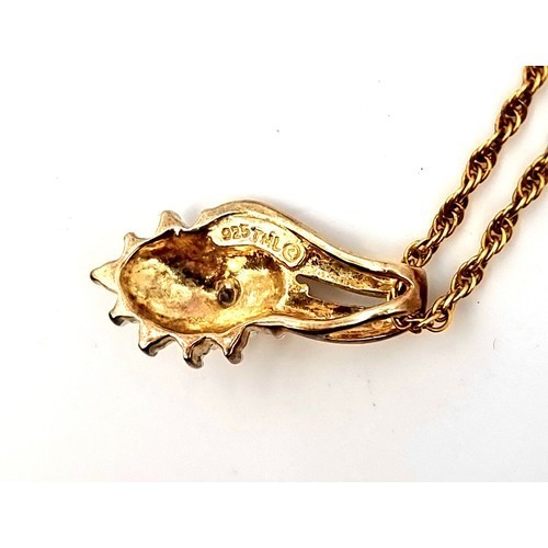 980 - Star Lot : A very pretty diamond set pendant and chain hallmarked nine carat gold. Length of chain -... 