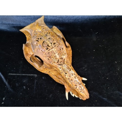 127 - Star lot : An interesting and authentic hand carved boar head engraved with intricate tribal carving... 