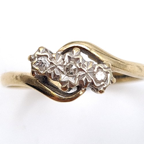 7 - A three stone illusion set diamond ring with twist mount hallmarked nine carat gold (375). Ring size... 