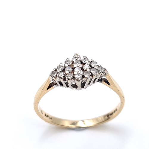 21 - A pretty diamond ring set in nine carat gold - 375. (Est weight of diamonds - 0.15 carats) Ring size... 