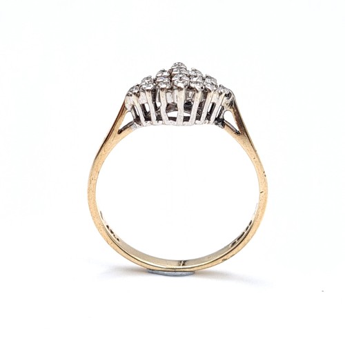 21 - A pretty diamond ring set in nine carat gold - 375. (Est weight of diamonds - 0.15 carats) Ring size... 