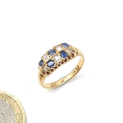 40 - Star Lot : A lovely Antique diamond and sapphire stone ring marked 18 Carat gold to band. Ring size ... 