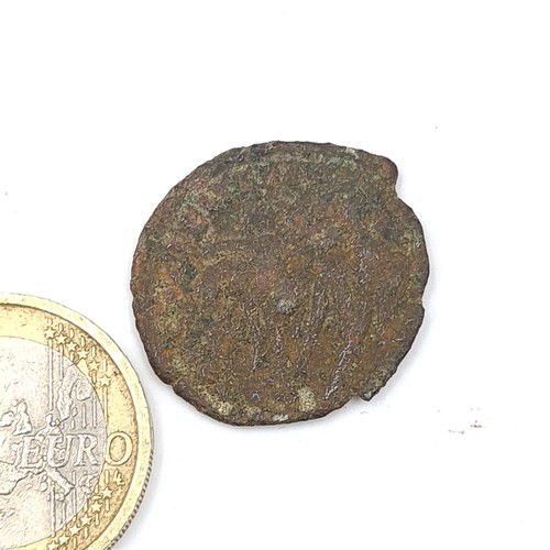 55 - A large roman coin in encapsulated container. Good detail for the age 1600-2200 years old, great for... 