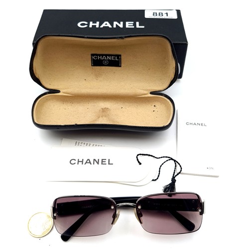 881 - A pair of outstanding Chanel sunglasses in as new condition in original tags. Together with case and... 