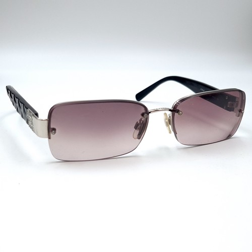 881 - A pair of outstanding Chanel sunglasses in as new condition in original tags. Together with case and... 