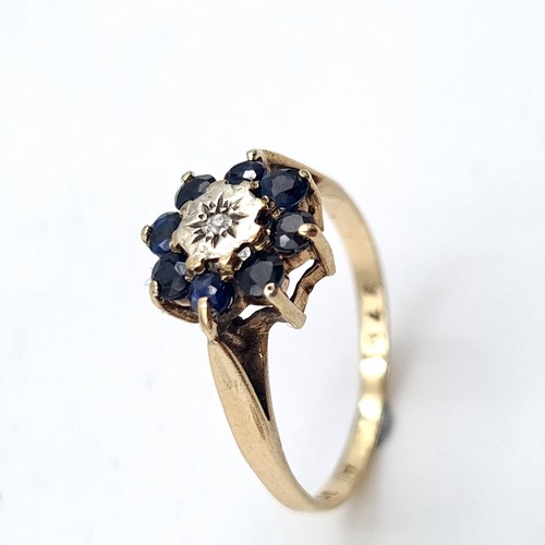 933 - Star lot : A lovely vintage illusion set diamond ring with sapphire gemstone surround hallmarked Bir... 