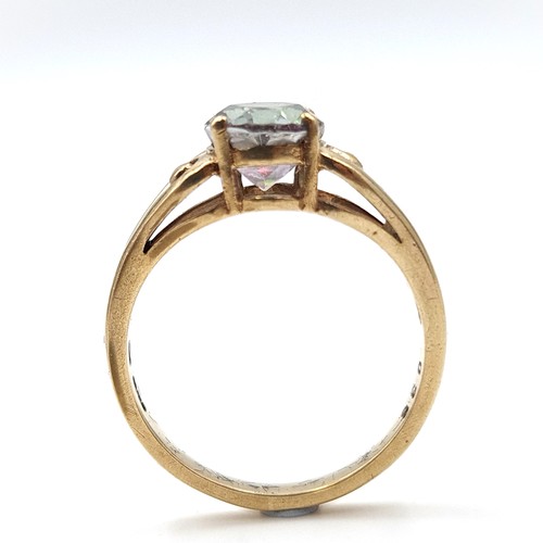 935 - Star Lot : A beautiful Mystic Topaz  nine carat gold ring (375) Size - P. Weight - 3.45 grams. Boxed... 