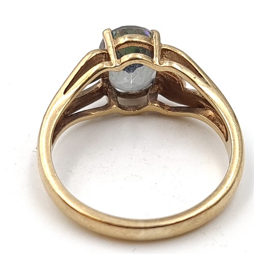 935 - Star Lot : A beautiful Mystic Topaz  nine carat gold ring (375) Size - P. Weight - 3.45 grams. Boxed... 