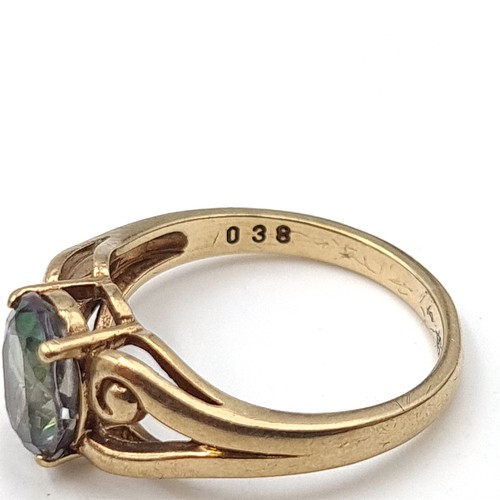 935 - Star Lot : A beautiful Mystic Topaz  nine carat gold ring (375) Size - P. Weight - 3.45 grams. Boxed... 