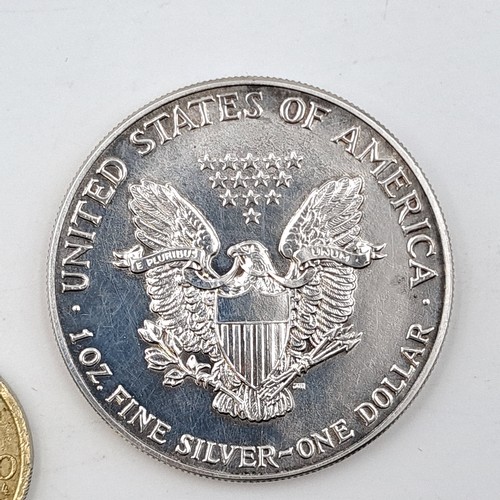 950 - A United States of America 1987 Liberty walking American silver eagle in one ounce fine silver and u... 