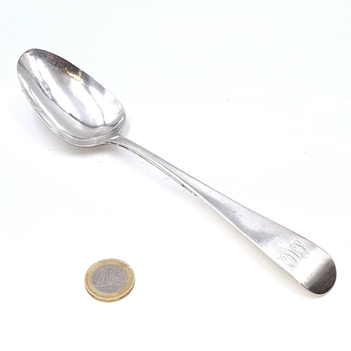 13 - A large Irish silver Georgian basting spoon dated 1808. Dimensions - 22 cms. Weight - 64.2 grams.