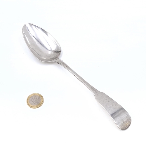 14 - A Large Irish silver basting spoon dated - 1816. Length - 22 cms. Weight - 67.4 grams.