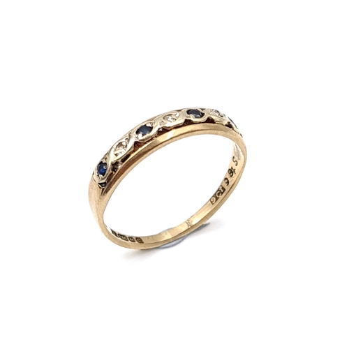 2 - Star Lot : An antique diamond and sapphire half eternity ring set in nine carat gold. Ring size - K.... 
