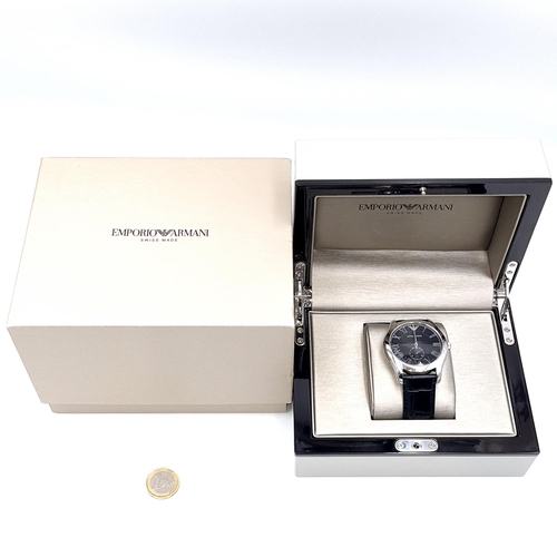 30 - Star Lot : A Swiss made  gents Emporio Armani wristwatch in As new condition set with roman numeral ... 
