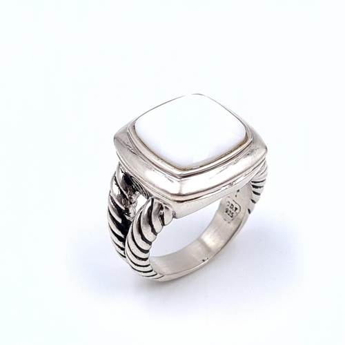 39 - A heavy new  sterling silver marked gents  ring with facet white gem set mount with rope twist shoul... 