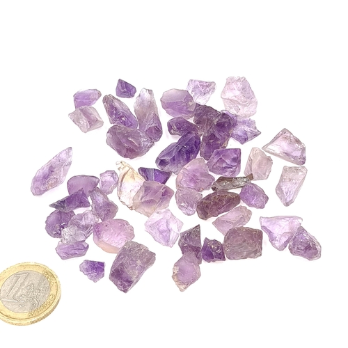 56 - A collection of rough cut Amethyst gemstones with a total weight of 286 carats.