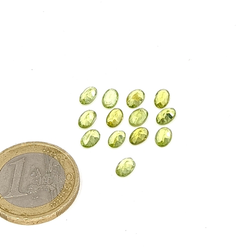 59 - A collection of facet cut Peridot stones of 5.45 carats.