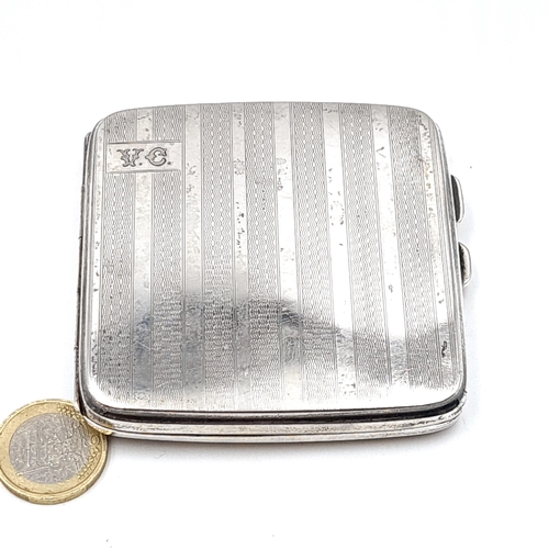 9 - A very nice example of a sterling silver cigarette case with machine cut finish hallmarked Birmingha... 