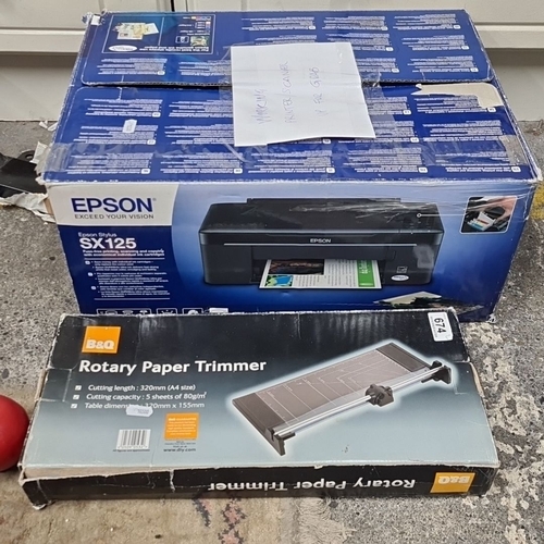 674 - Epson Stylus SX125 printer/scanner in original box, model C11CA82301. Comes with B&Q Rotary Paper Tr... 