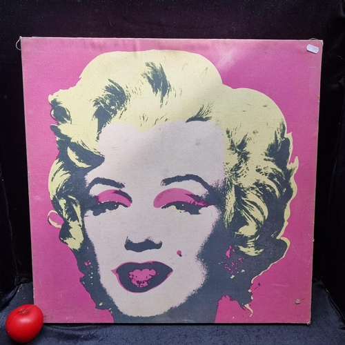 128 - A printed canvas of Marilyn Monroe after Andy Warhol's famous Pop Art painting.